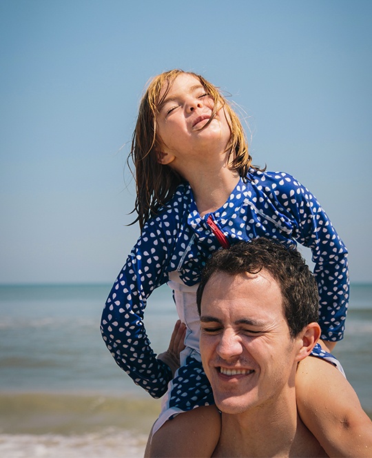 Dad and daughter at the beach